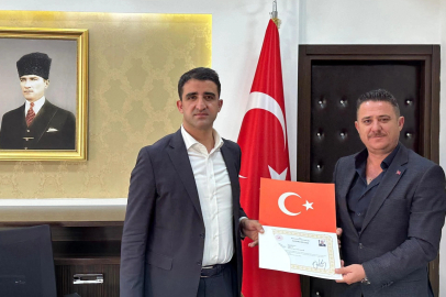 İpsala'dan Keşan’a atanan Müdür Karbuz’a Kaymakam Sevgili'den başarı belgesi